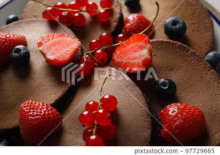 Concept of sweet food, chocolate pancakes, close up 97729665