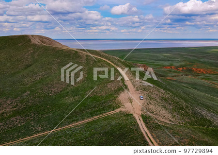 Amazing distant landscape of mountain Big Bogdo taken with drone. Russia 97729894