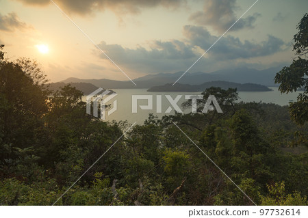 Sunset over tropical islands Phrao Nok and Phrao Nai, Thailand Sunset over tropical islands Phrao Nok and Phrao Nai, Thailand 97732614