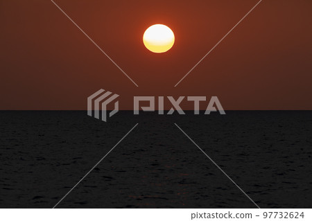 A huge sunset sun, Togian Islands, Indonesia 97732624