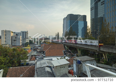 A train in Jakarta, Indonesia, near Gondangdia train station 97732710