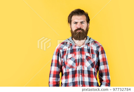 Dressing with style. Trendy hipster with mustache and beard in brutal hipster  style. Fashion caucasian man wearing casual style. Bearded man with  fashionable hair style Stock Photo