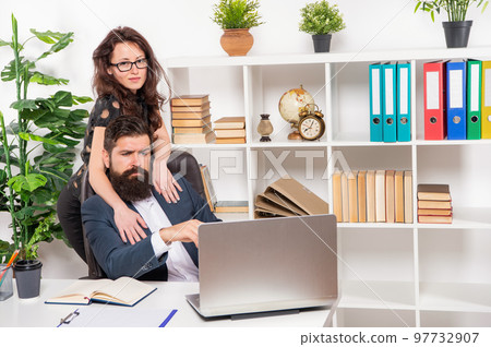 Finding love from 9 to 5. Professional couple in love. Office romance.. Office affair. Flirting at work. 97732907