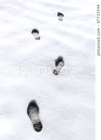 Snowfield with footprints Snowfield with footprints 97733544