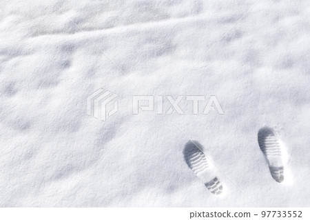 Snowfield with footprints Snowfield with footprints 97733552