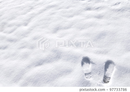 Snowfield with footprints Snowfield with footprints 97733786
