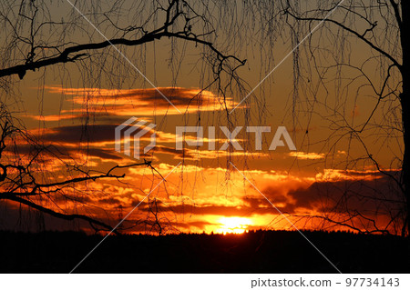 Beautiful background with a fiery red sunset Beautiful background with a fiery red sunset 97734143