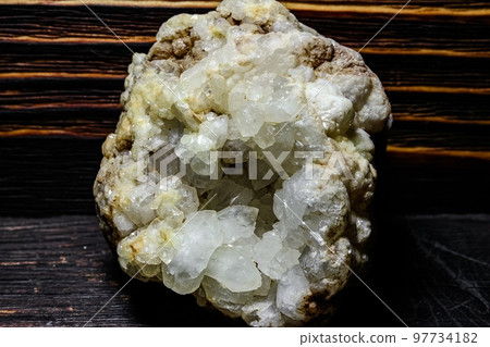 Druse of quartz mineral (rock crystal) close up 97734182