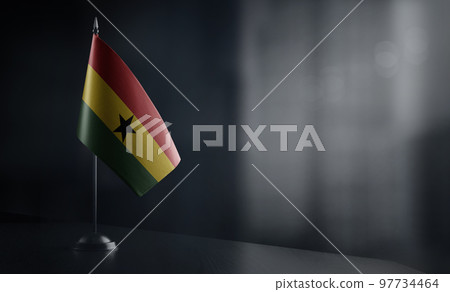 Small national flag of the Ghana on a black background 97734464