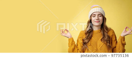 Keep calm carry on. Portrait relieved happy meditating charming young woman learn control feelings breething yoga practice smiling delighted relaxed close eyes hands sideways zen nirvana gesture Keep calm carry on. Portrait relieved happy meditating charming young woman learn control feelings breething yoga practice smiling delighted relaxed close eyes hands sideways zen nirvana gesture 97735136