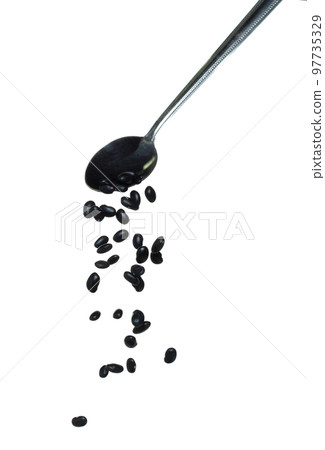 Black Bean fall, black grain beans explode abstract cloud fly from silver spoon. Beautiful complete seed pea bean, food object design. Selective focus freeze shot white background isolated 97735329