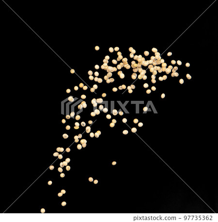 Soy Bean flying explosion, yellow grain beans explode abstract cloud fly. Beautiful complete seed pea soy bean splash in air, food object design. Selective focus freeze shot black background isolated 97735362