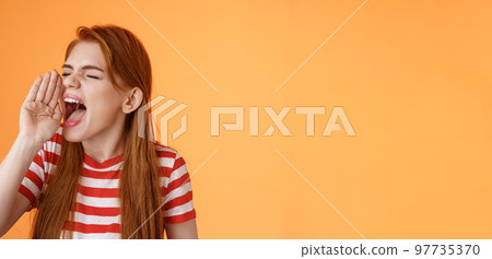 Hey where are you. Cute carefree redhead funny girl hold hand near opened mouth turn left close eyes, yelling out loud, searching someone, calling friend come upstairs, look for person distance Hey where are you. Cute carefree redhead funny girl hold hand near opened mouth turn left close eyes, yelling out loud, searching someone, calling friend come upstairs, look for person distance 97735370