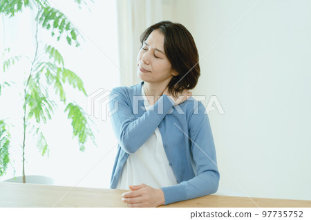 Middle woman with stiff shoulders 97735752