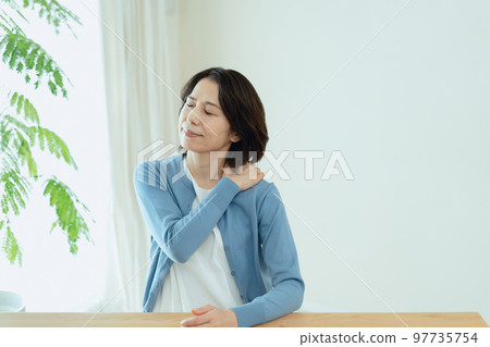 Middle woman with stiff shoulders 97735754