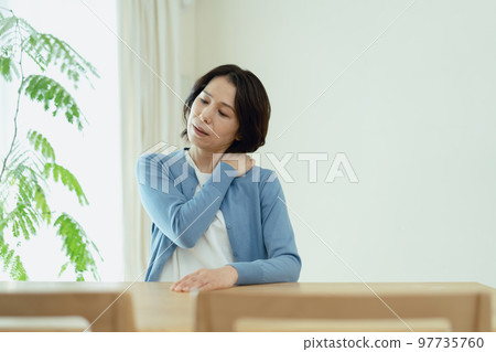 Middle woman with stiff shoulders 97735760