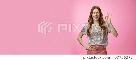 Okay got it. Charming friendly-looking outgoing glamour young attractive woman show ok no problem gesture smiling assured confident everything perfect, recommend excellent service, pink background 97736272