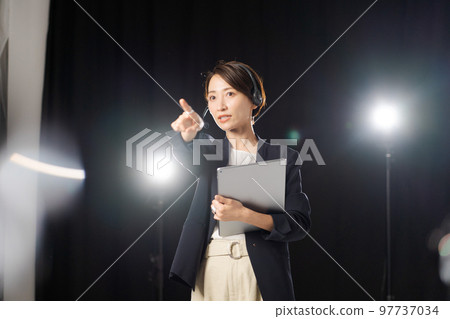 women working behind the scenes women working behind the scenes 97737034