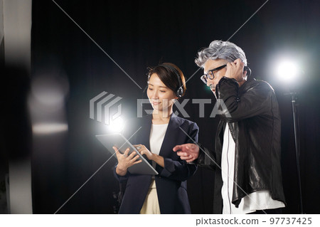 people working behind the scenes people working behind the scenes 97737425