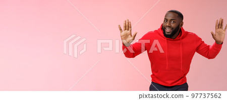Happy charming outgoing african american male model raise hands joking standing surrender smiling give up girlfriend won grinning agree go dinner restaurant, standing pink background 97737562