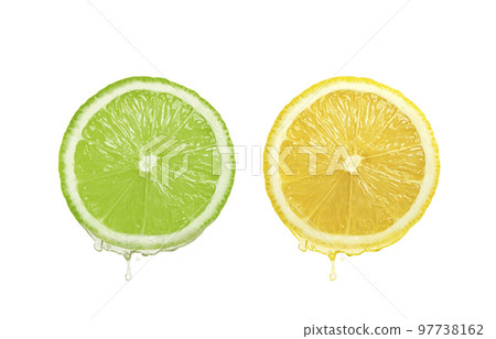 Lemon juice dripping from fruit on white background 97738162