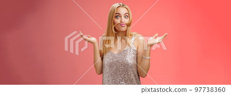 Who told I adult. Playful carefree funny charming blond woman make moustache from hair strand mimicking old man shrugging hands sideways questioned fool around playing red background Who told I adult. Playful carefree funny charming blond woman make moustache from hair strand mimicking old man shrugging hands sideways questioned fool around playing red background 97738360