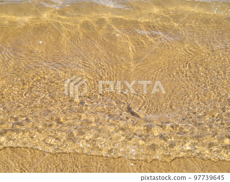 The beach of the sandy beach of the calm and beautiful sea. The beach of the sandy beach of the calm and beautiful sea. 97739645