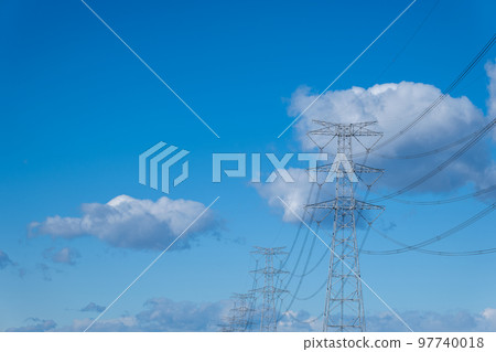 Power lines, blue sky and white clouds Power lines, blue sky and white clouds 97740018