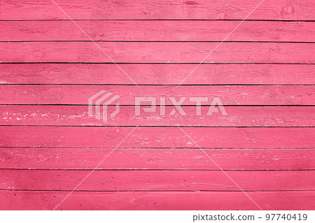 Trendy color of the year 2023. Wooden planks boards, gorizontal pattern, toned in viva magenta color as background or texture Trendy color of the year 2023. Wooden planks boards, gorizontal pattern, toned in viva magenta color as background or texture 97740419