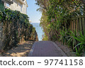 Concrete tiles pathway with a view of the blue sea at San Clemente, California 97741158
