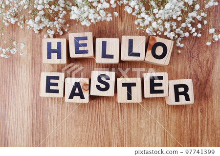 Hello Easter alphabet letters on wooden background Hello Easter alphabet letters on wooden background 97741399