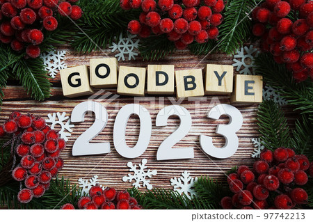 Goodbye 2023 holidays celebration with christmas decorations background 97742213