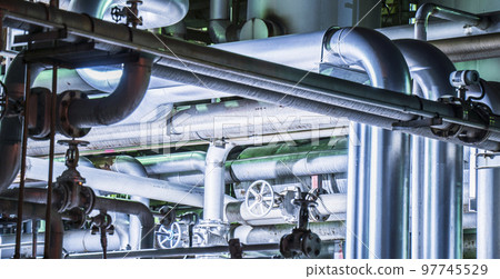 Metallic pipeline in a factory [Industrial image] 97745529