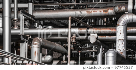 Metallic pipeline in a factory [Industrial image] 97745537