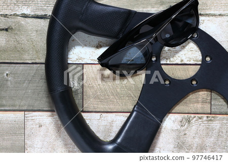 car steering wheel and sunglasses car steering wheel and sunglasses 97746417