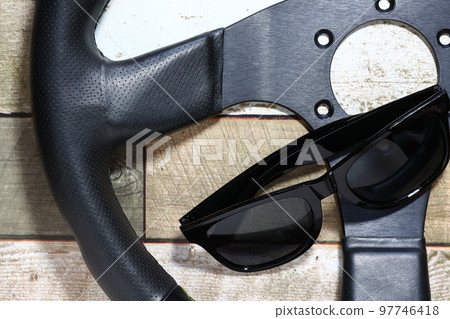 car steering wheel and sunglasses car steering wheel and sunglasses 97746418