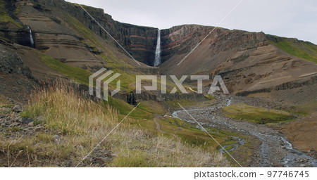 Hengifoss Waterfall, Hiking path and foliage in foreground, East Iceland 97746745