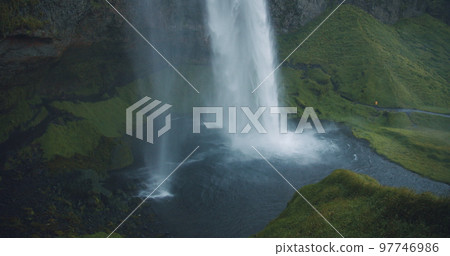 Rainy moody shoot of Seljalandfoss waterfall Iceland 97746986