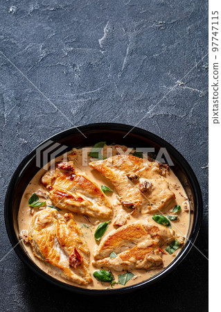 Chicken Cutlets With Sun-Dried Tomato Cream Sauce Chicken Cutlets With Sun-Dried Tomato Cream Sauce 97747115