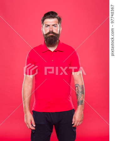 Barber salon. Man bearded hipster with long beard and mustache on red background. Hairstyle is kind of art. Well groomed hipster. Barbershop concept. Facial hair care. Hiring barber. Barber career 97748367
