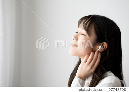 woman immersed in music woman immersed in music 97748708