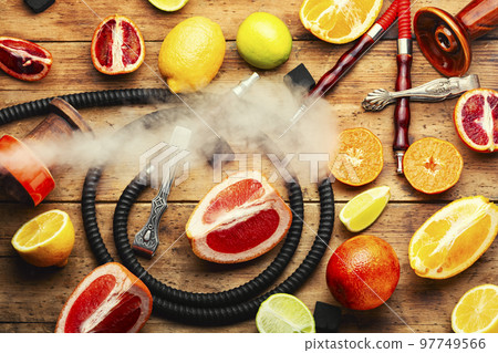Hookah or kalian with citrus tobacco. Hookah or kalian with citrus tobacco. 97749566