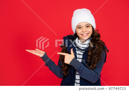 happy teen girl on red background with copy space. 97749723