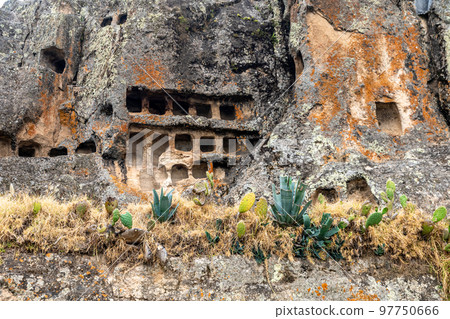 Ventanillas de Otuzco Peruvian archaeological site, cemetery in the rock Ventanillas de Otuzco Peruvian archaeological site, cemetery in the rock 97750666