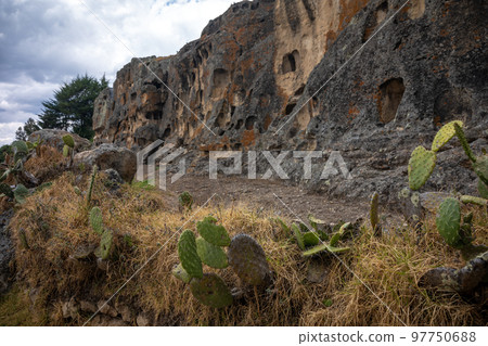 Ventanillas de Otuzco Peruvian archaeological site, cemetery in the rock 97750688