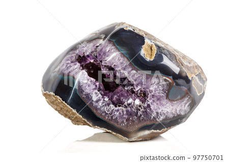 Macro Mineral Stone Amethysts in the rock on a white background 97750701