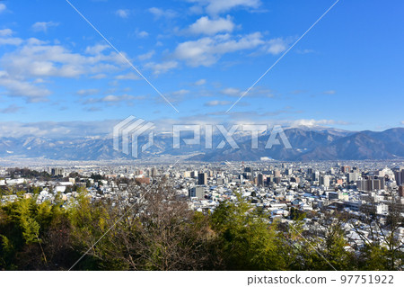 Winter city of Nagano overlooking Sugadaira in the distance Winter city of Nagano overlooking Sugadaira in the distance 97751922