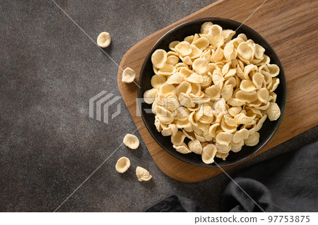 Fresh orecchiette pasta made from whole wheat flour. Fresh orecchiette pasta made from whole wheat flour. 97753875
