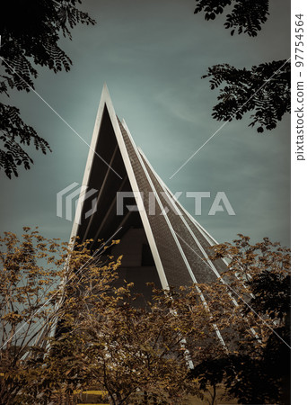 Architecture view of The Modern building with trees garden with blue sky background. Architecture view of The Modern building with trees garden with blue sky background. 97754564
