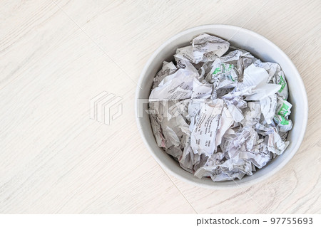 Used sales receipts prepared for recycling. Recyclable materials. Waste to be recycled. Free space. Used sales receipts prepared for recycling. Recyclable materials. Waste to be recycled. Free space. 97755693